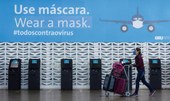 OMS recomenda uso de máscaras a viajantes